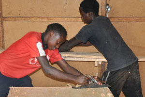 Students gained carpentry skills while making own dining hall furniture
